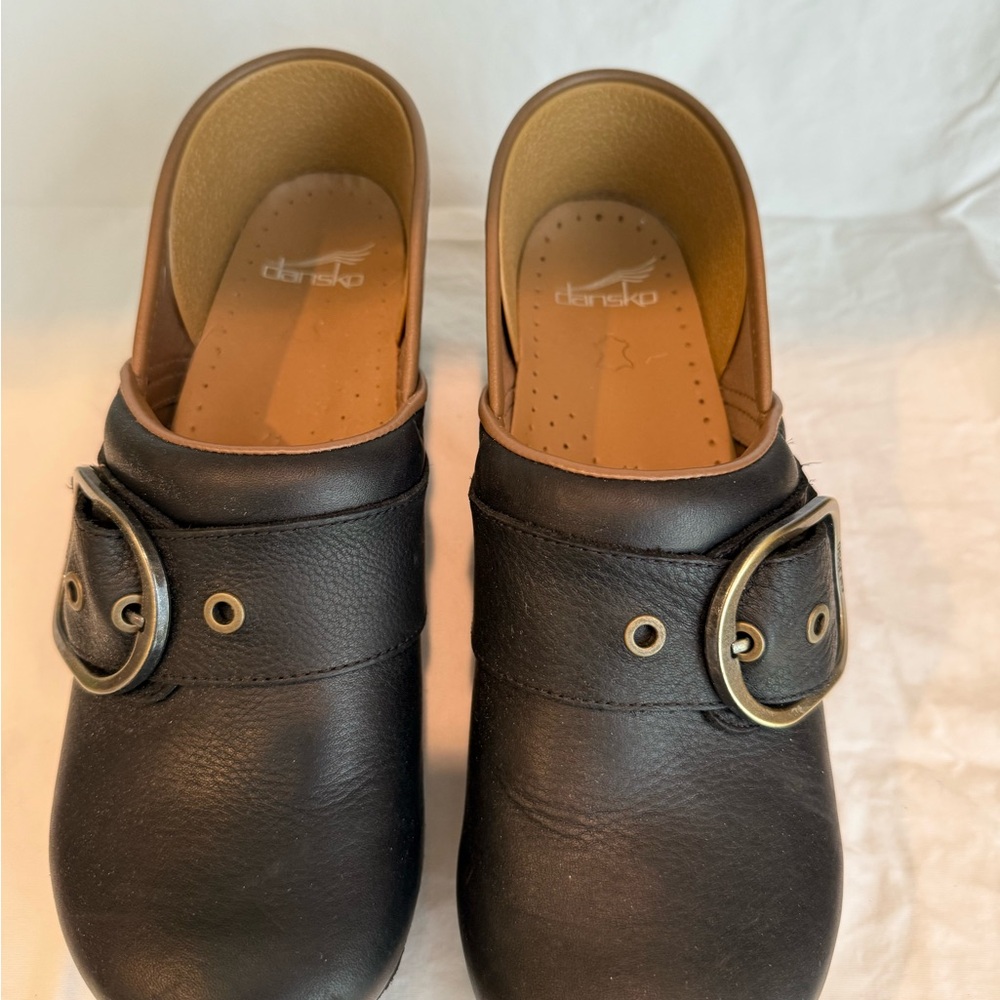 Dansko Black Leather Mules with Buckle Detail